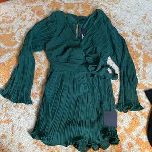 Lulu’s forest green romper